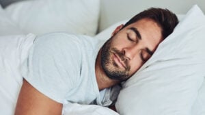 man sleeping to relieve stress